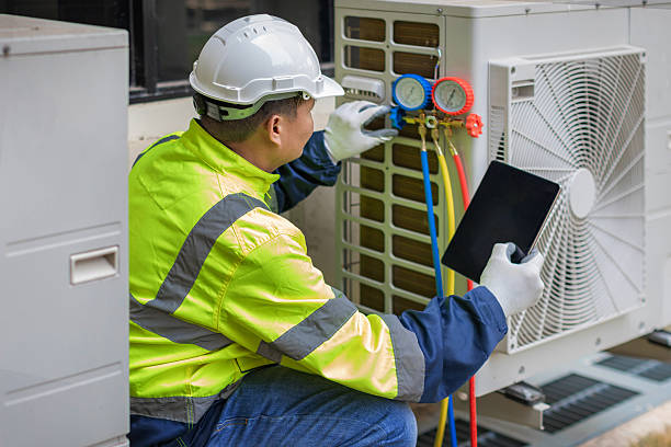 Professional Heat Pump Repair technician working in Freeburg, IL